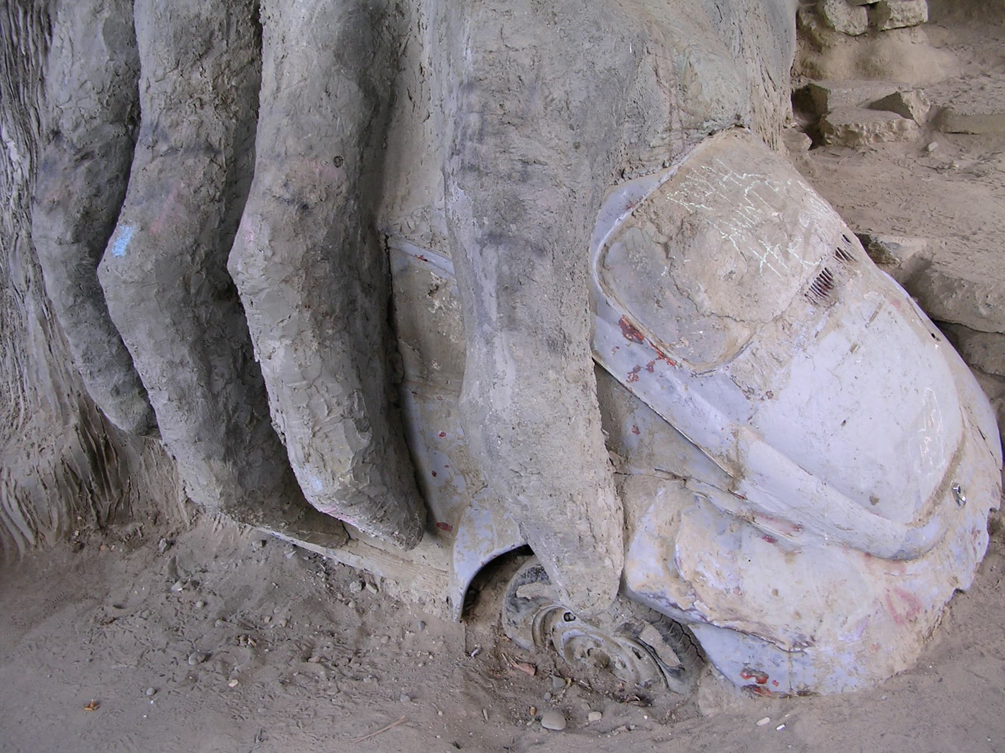 The Fremont Troll concrete hand and Volkswagen Beetle detail beneath the Aurora Bridge in Seattle